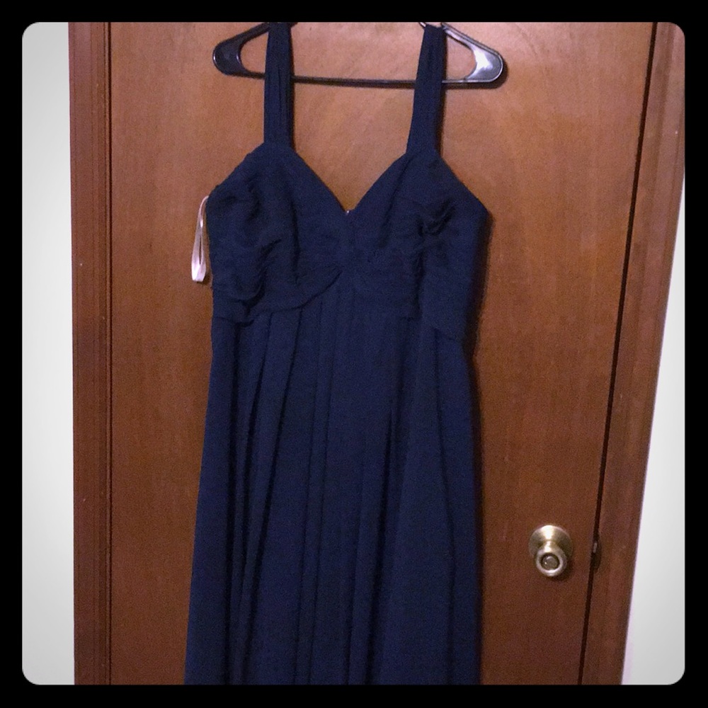 Floor length navy blue dress.